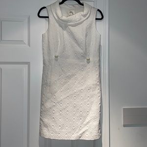 White Milly high neck dress with two buttons.
